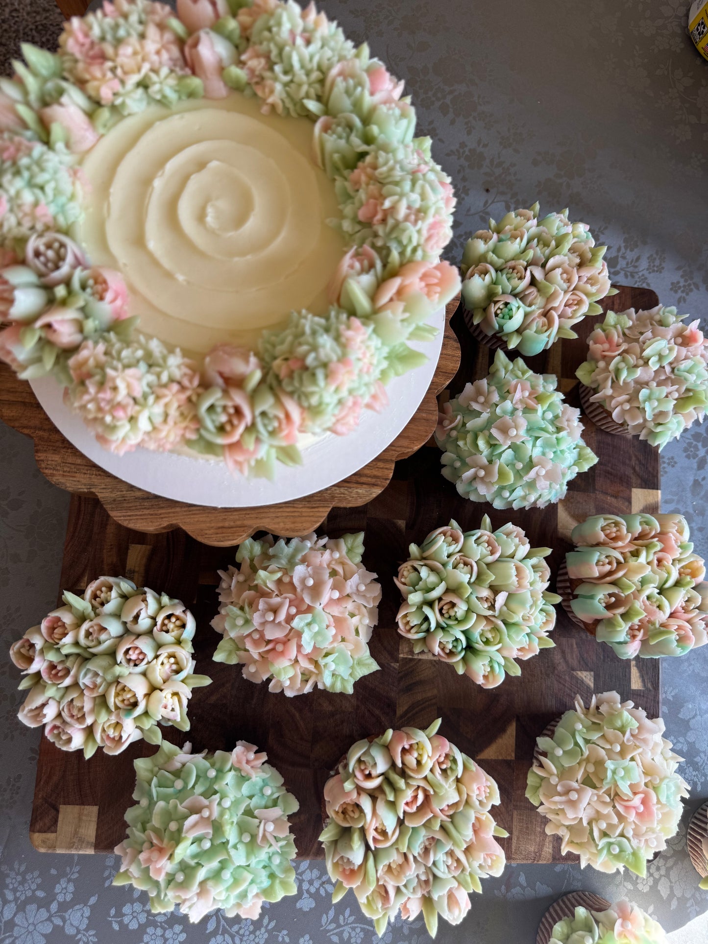 Floral cake and cupcakes